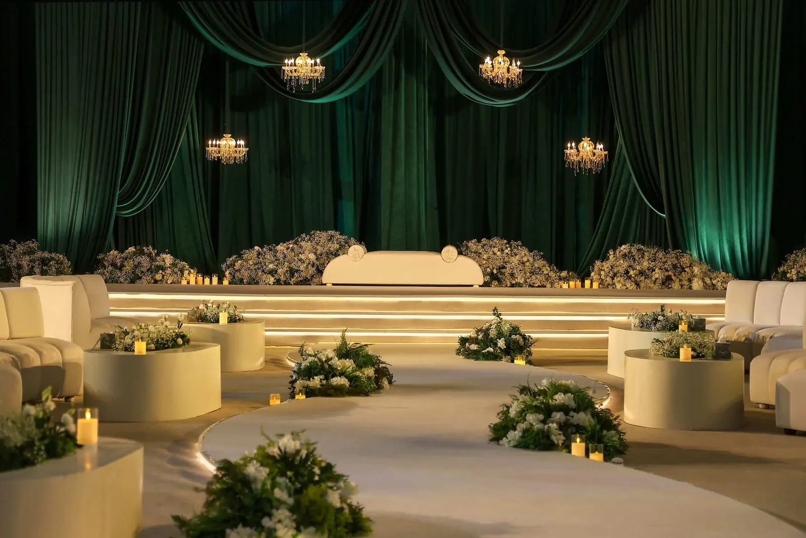 Emerald stage with ivory lounges